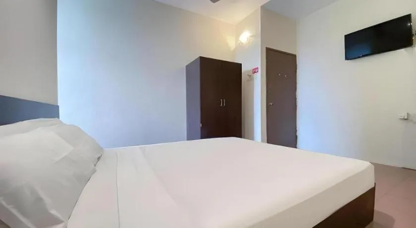 Bed in SPOT ON 91178 Motel Impian