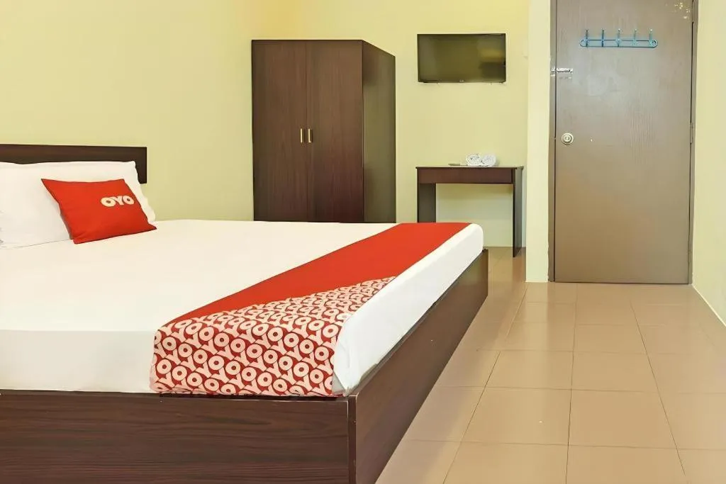 Bed in SPOT ON 91178 Motel Impian