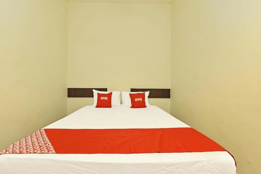 Bed in SPOT ON 91178 Motel Impian