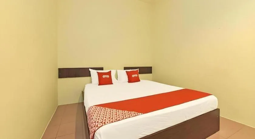 Bed in SPOT ON 91178 Motel Impian