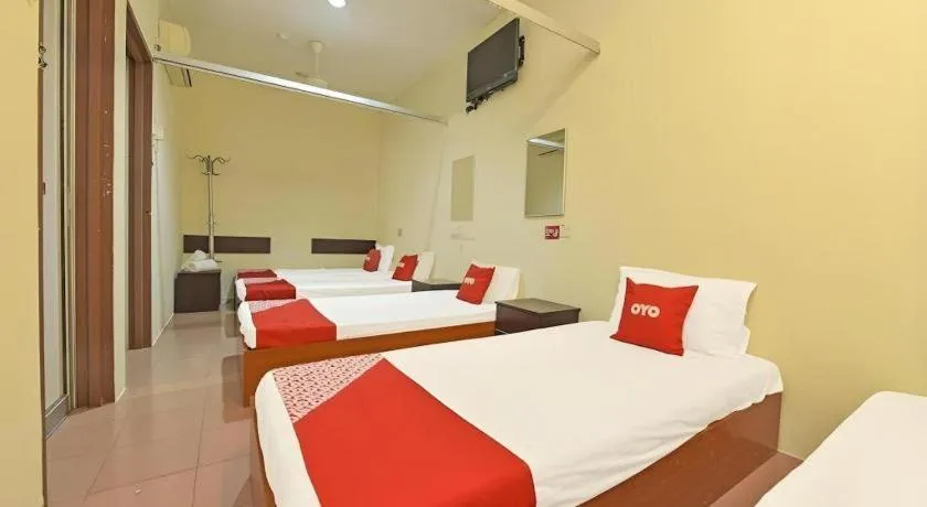 Bed in SPOT ON 91178 Motel Impian