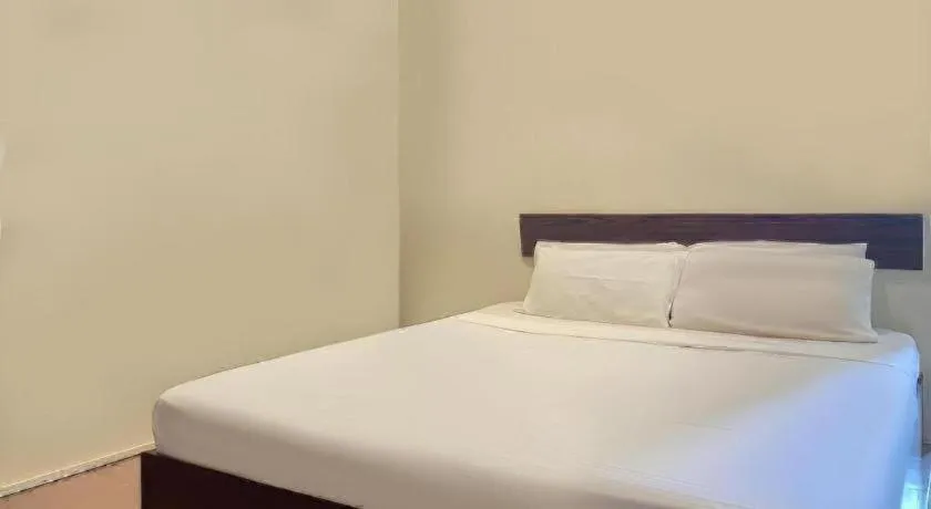 Bed in SPOT ON 91178 Motel Impian