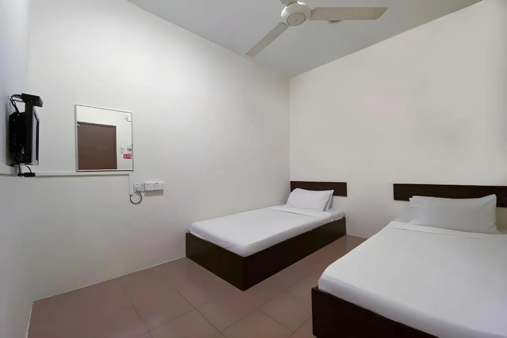 Bed in SPOT ON 91178 Motel Impian