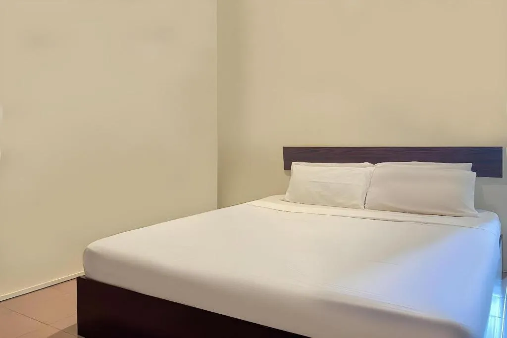 Bed in SPOT ON 91178 Motel Impian