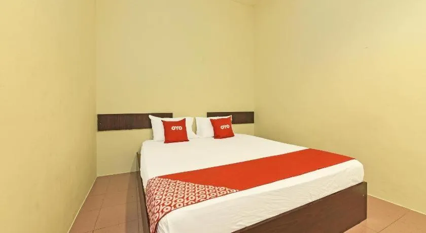 Bed in SPOT ON 91178 Motel Impian