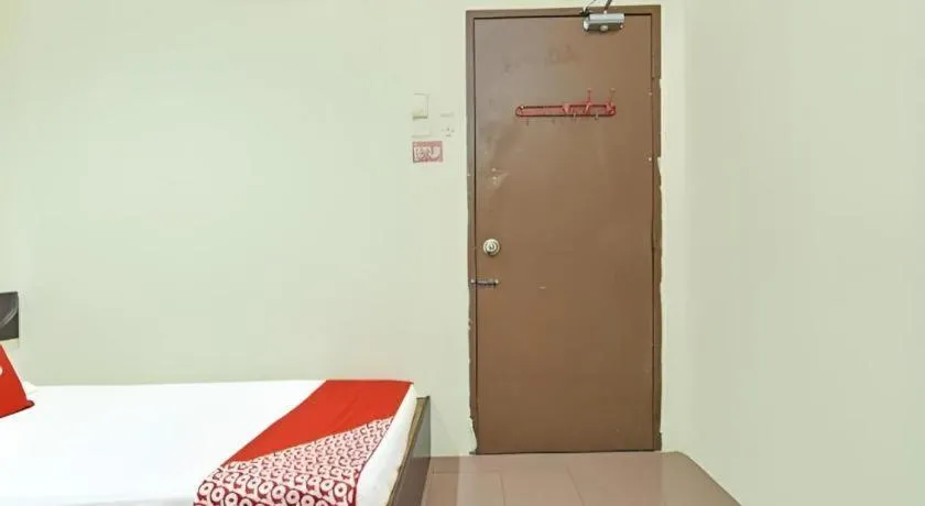 Bed in SPOT ON 91178 Motel Impian