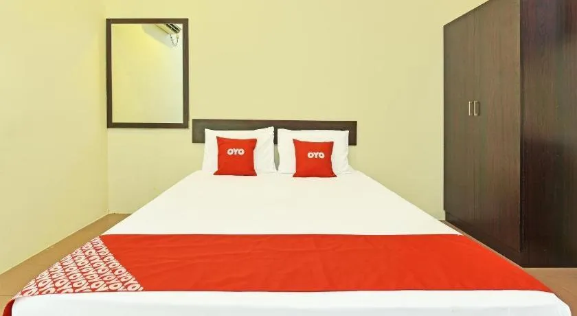 Bed in SPOT ON 91178 Motel Impian