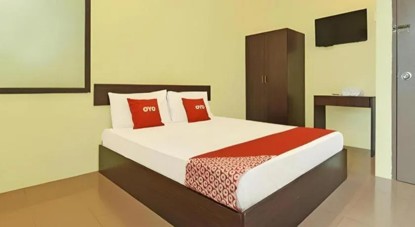 Bed in SPOT ON 91178 Motel Impian