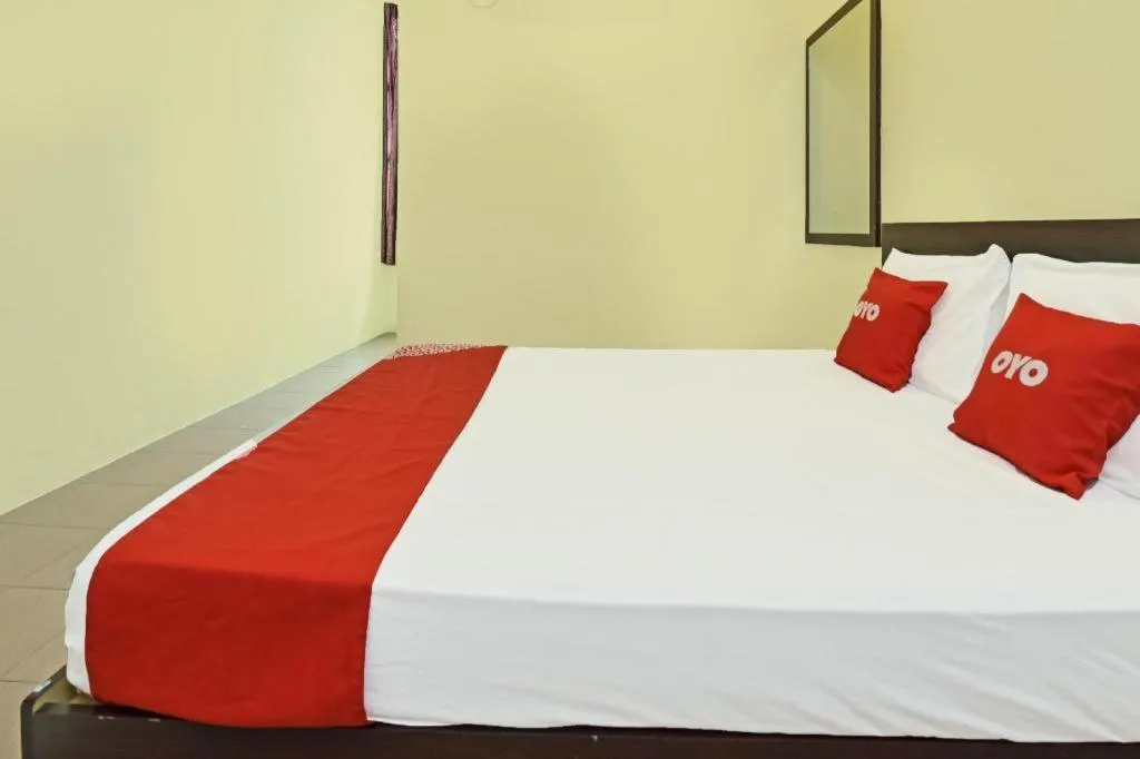 Bed in SPOT ON 91178 Motel Impian