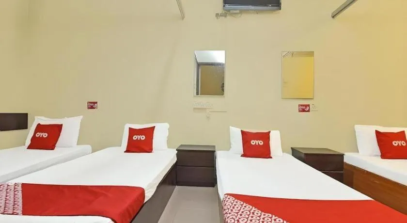 Bed in SPOT ON 91178 Motel Impian