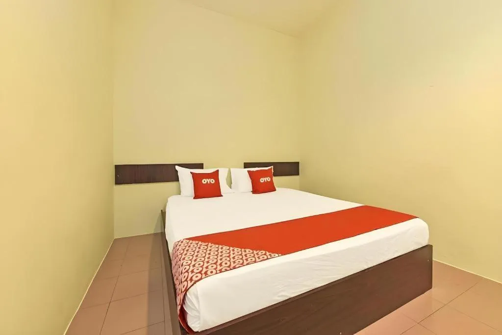 Bed in SPOT ON 91178 Motel Impian