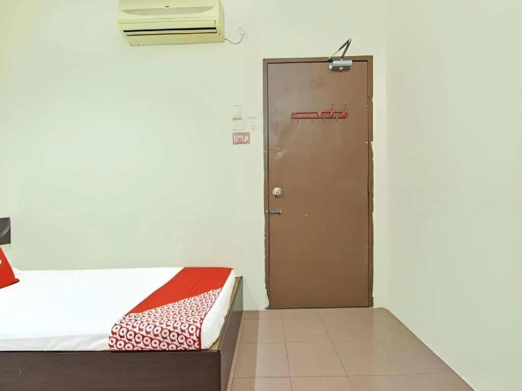 Bed in SPOT ON 91178 Motel Impian