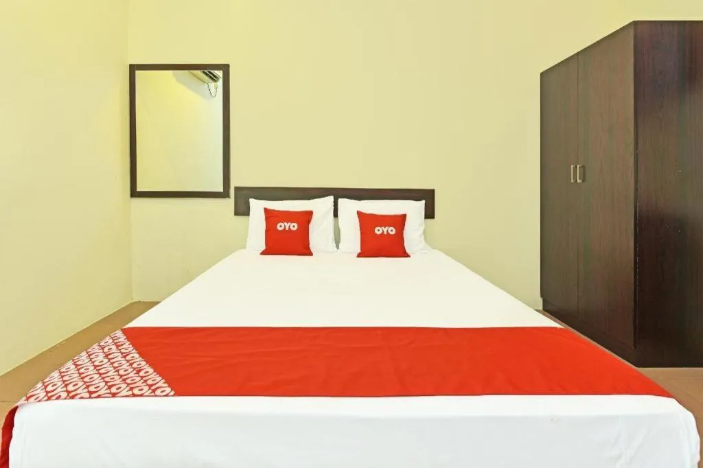 Bed in SPOT ON 91178 Motel Impian