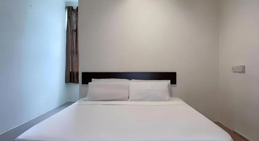 Bed in SPOT ON 91178 Motel Impian