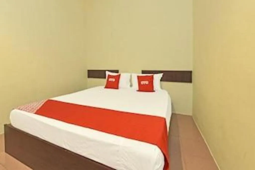 Bed in SPOT ON 91178 Motel Impian