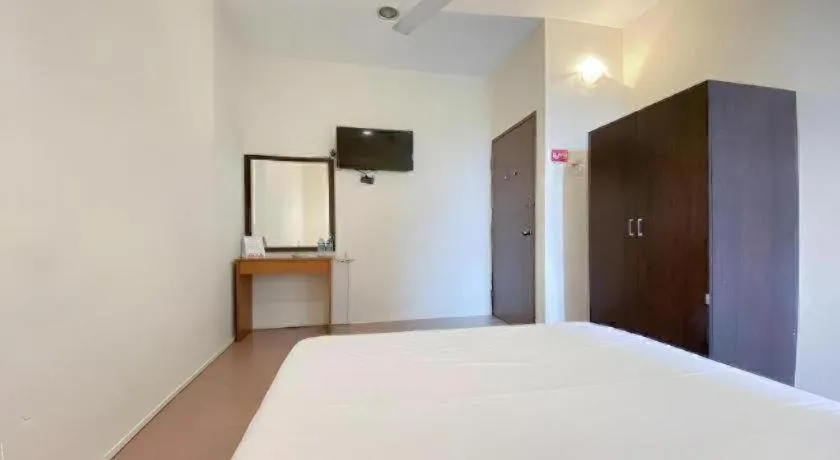 Bed in SPOT ON 91178 Motel Impian