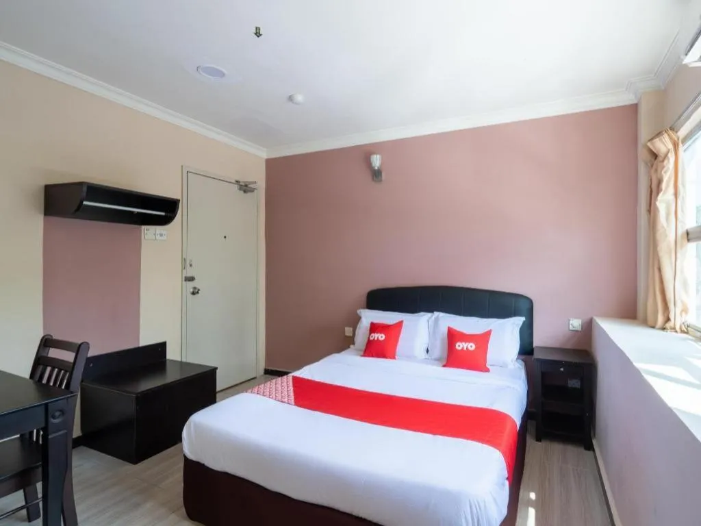 Bed in OYO 89844 Green Villa Hotel