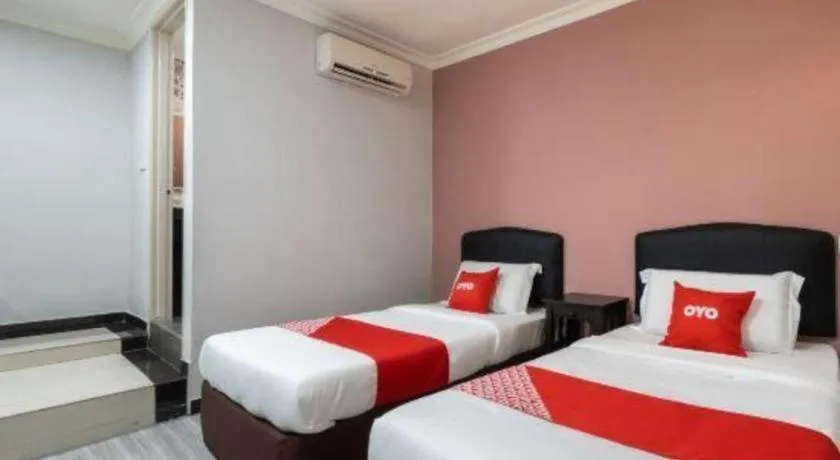 Bed in OYO 89844 Green Villa Hotel