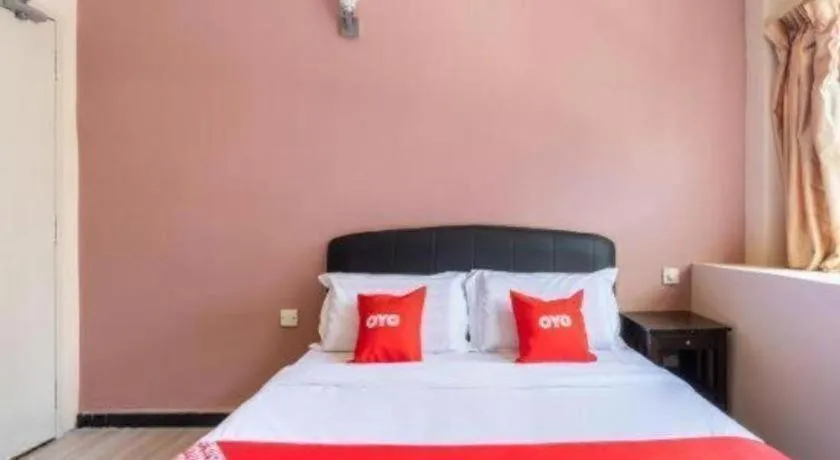 Bed in OYO 89844 Green Villa Hotel