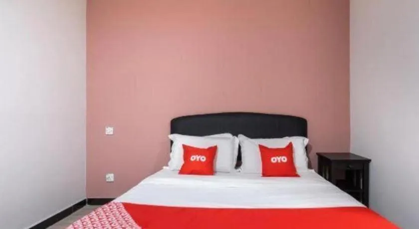 Bed in OYO 89844 Green Villa Hotel