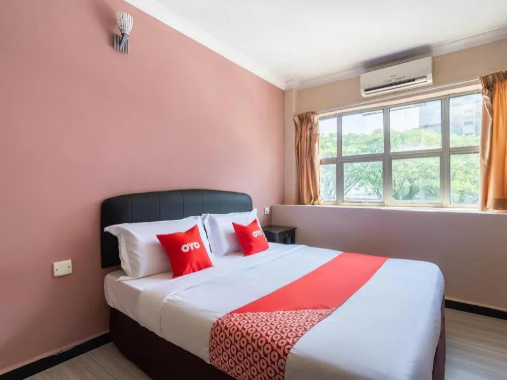 Bed in OYO 89844 Green Villa Hotel