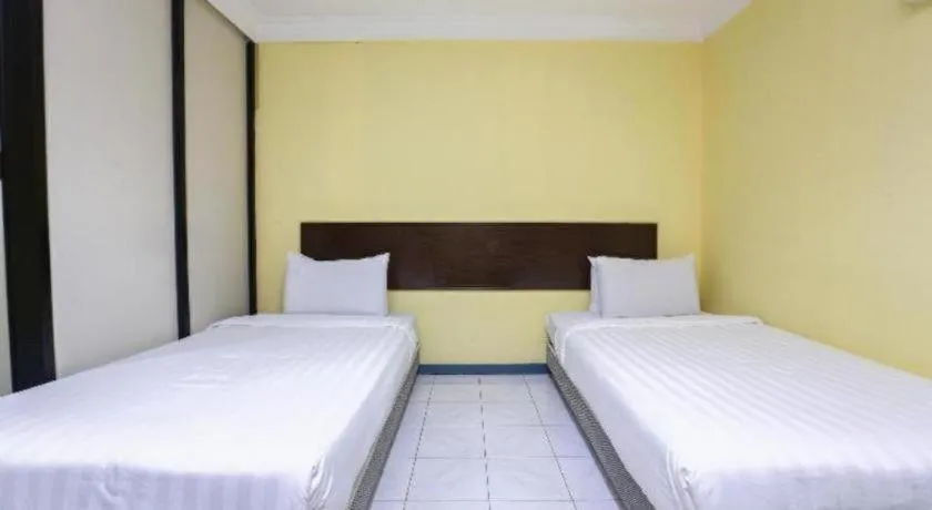Bed in OYO 89822 Hotel As Salam