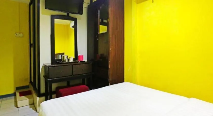 Bed in OYO 89822 Hotel As Salam