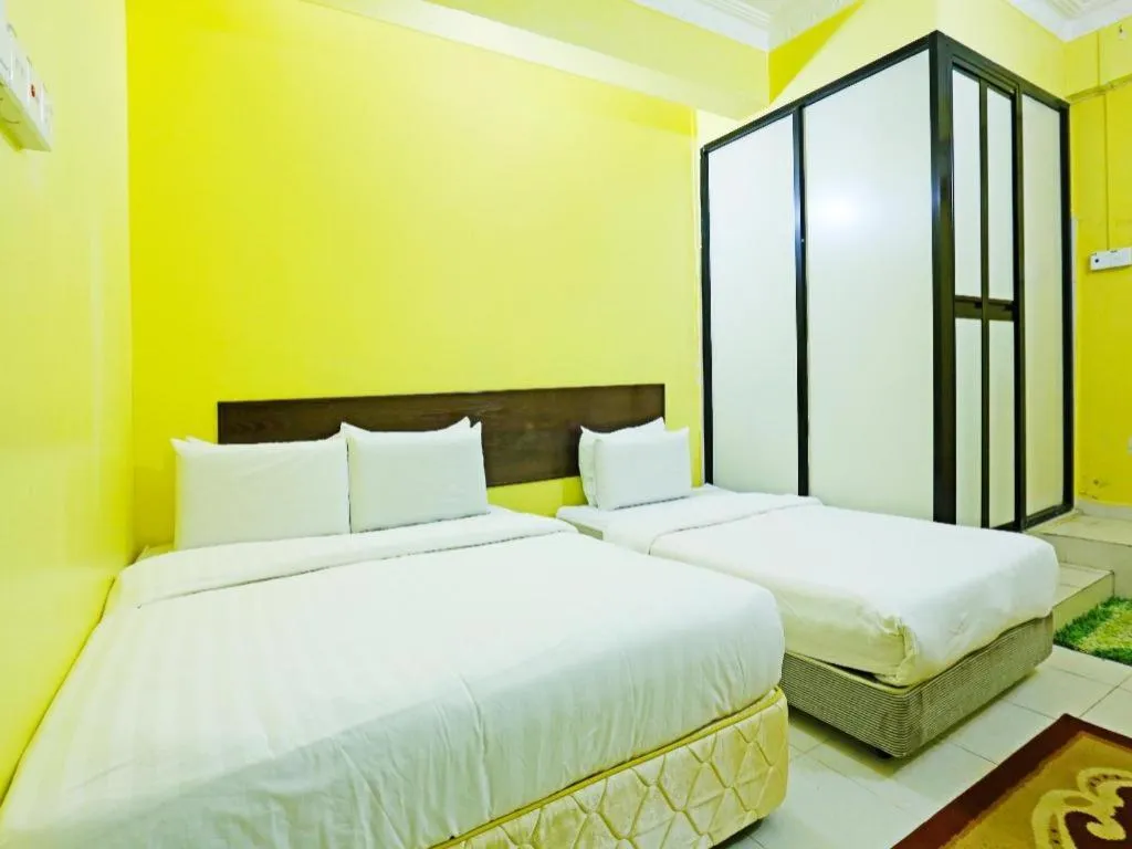 Bed in OYO 89822 Hotel As Salam