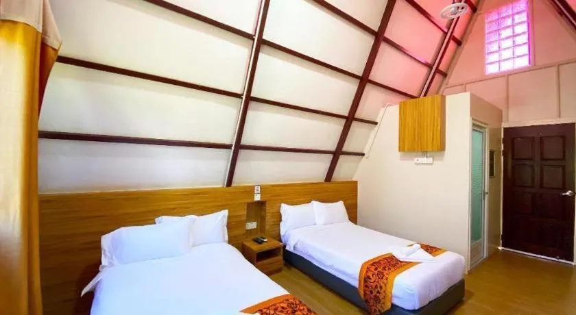 Bed in Dreamland Beach Holiday