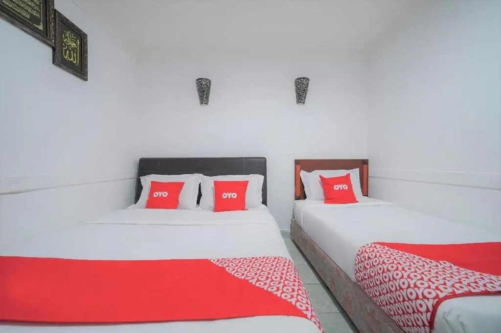 Bed in OYO 89850 Mutiara Motel