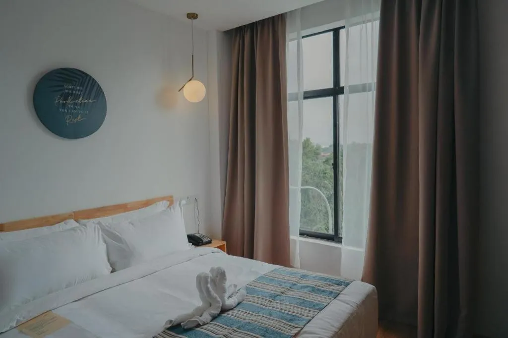 Bed in Bilik-Bilik by MUO