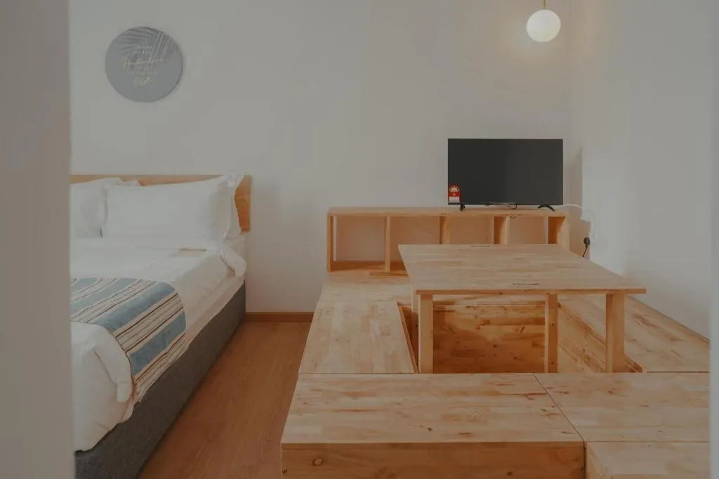 Bed in Bilik-Bilik by MUO