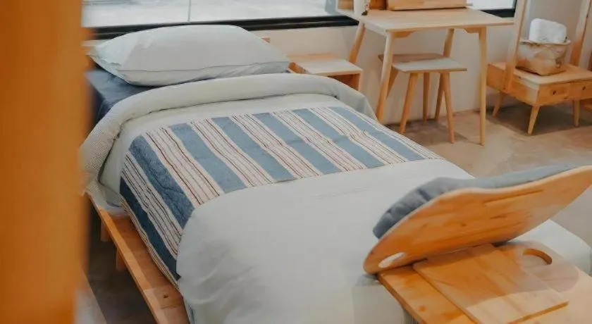 Bed in Bilik-Bilik by MUO