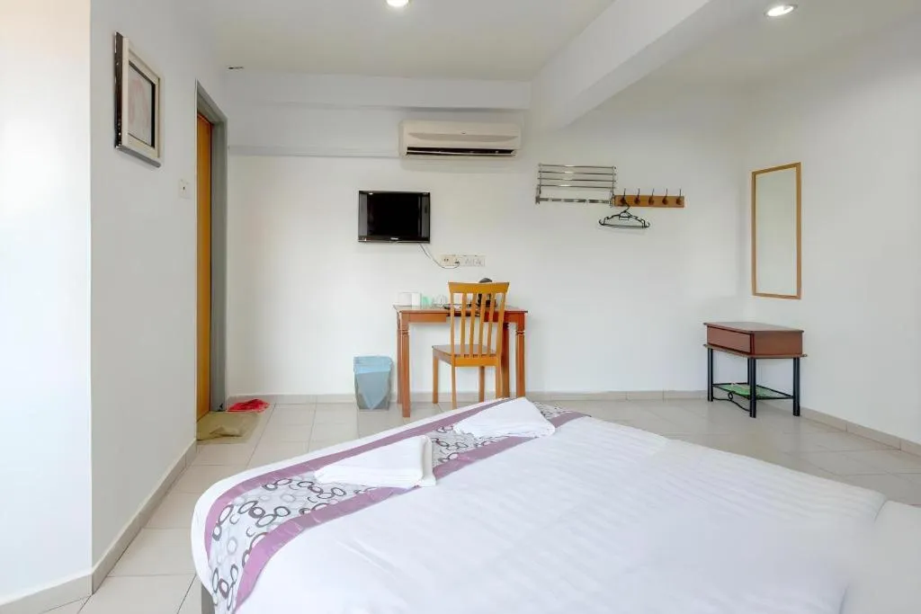 Bed in OYO 89874 Gs Golden Star Hotel