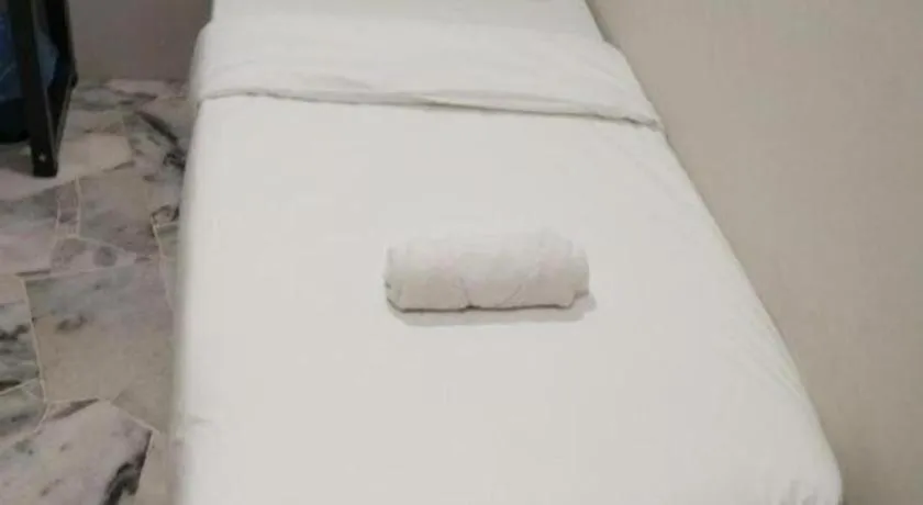 Bed in OYO 89874 Gs Golden Star Hotel