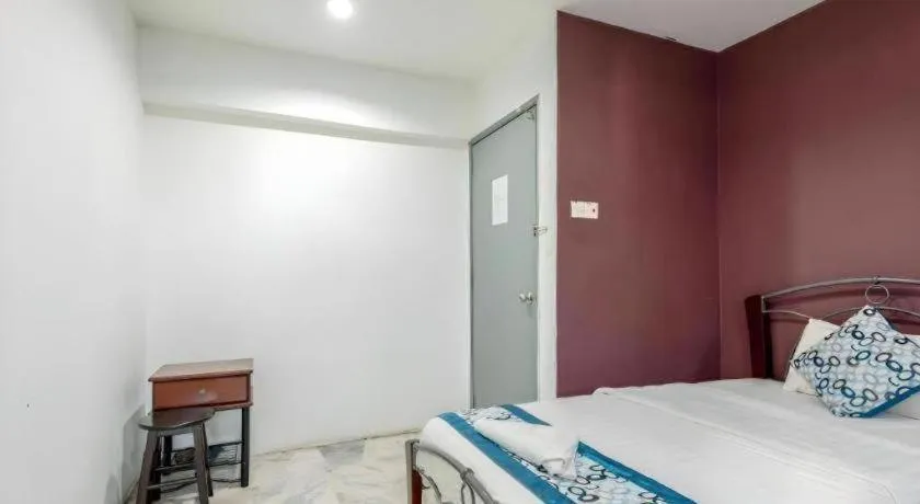 Bed in OYO 89874 Gs Golden Star Hotel