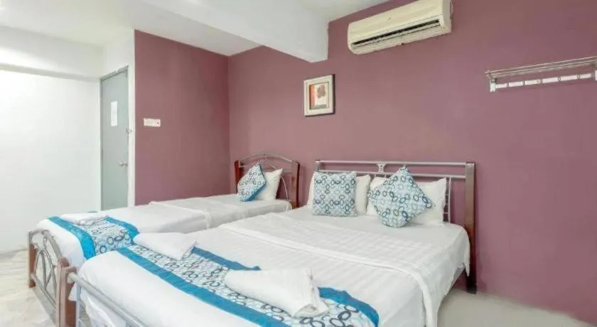 Bed in OYO 89874 Gs Golden Star Hotel