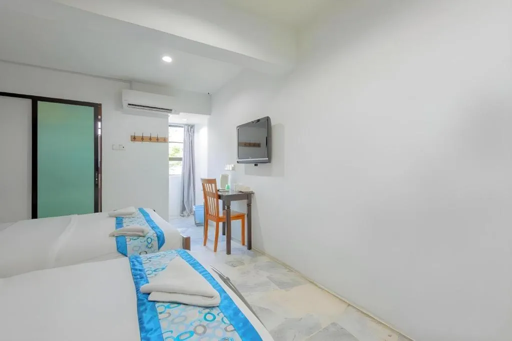 Bed in OYO 89874 Gs Golden Star Hotel