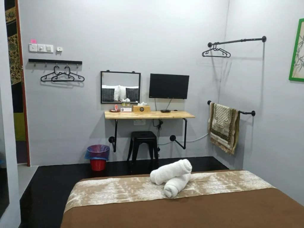 Bed in Oyasumi Hotel