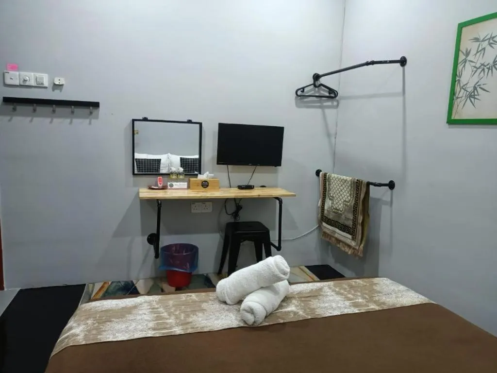 Bed in Oyasumi Hotel