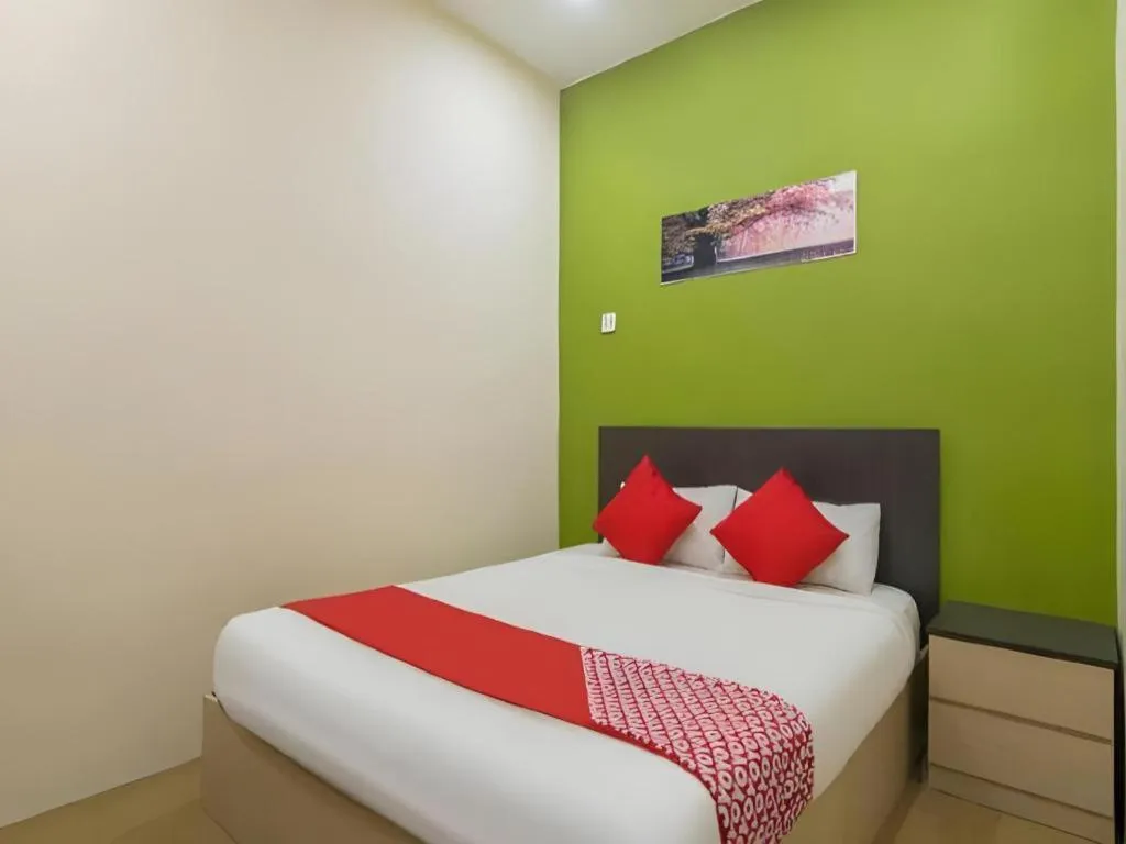 Bed in Oyasumi Hotel