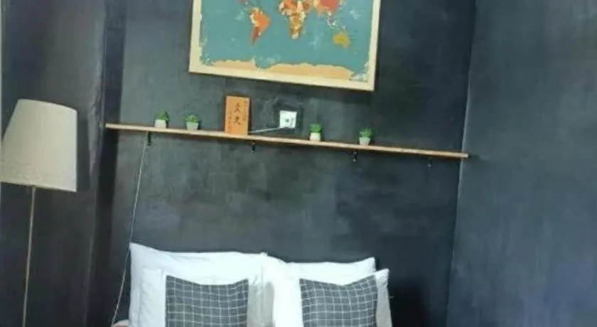 Bed in Oyasumi Hotel