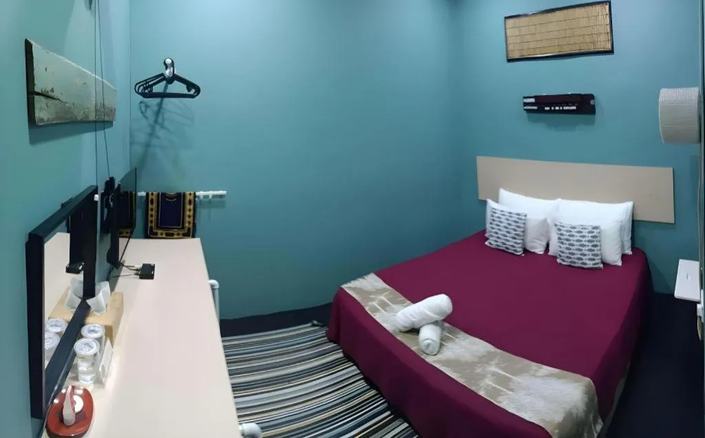 Bed in Oyasumi Hotel