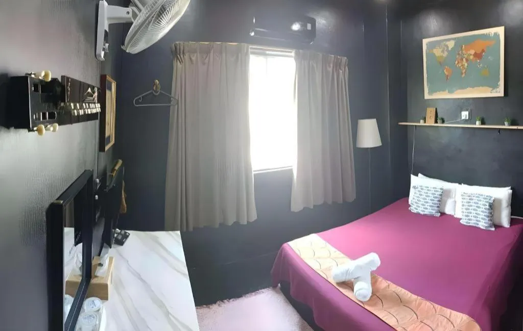 Bed in Oyasumi Hotel