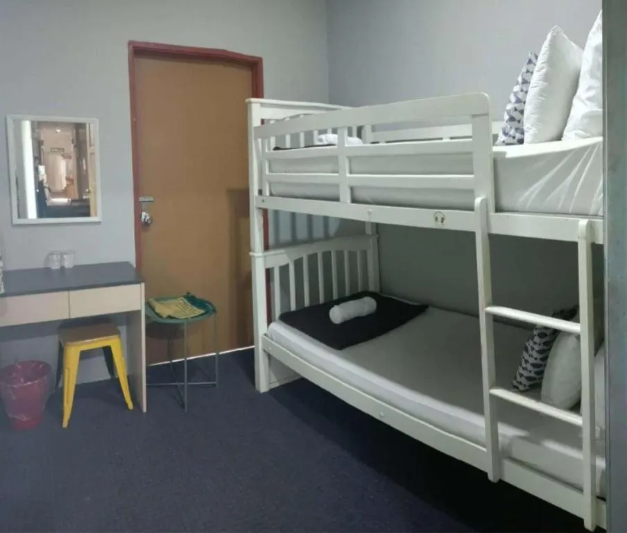 Bed in Oyasumi Hotel