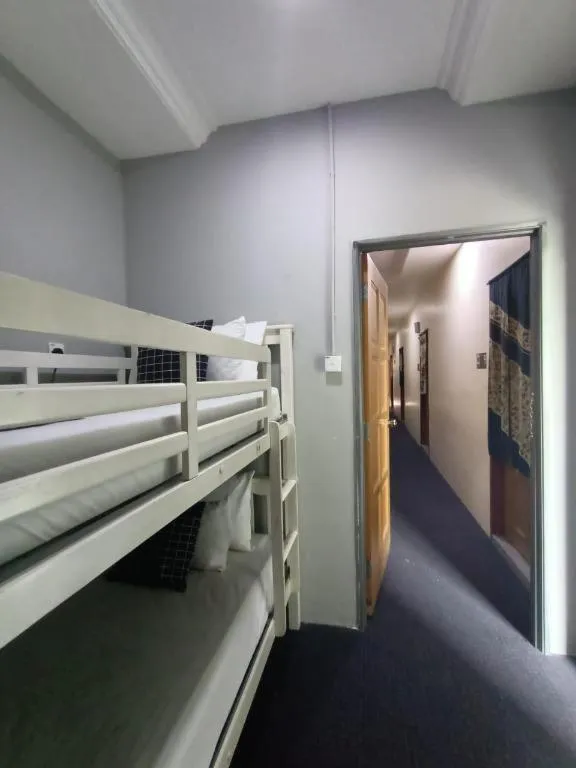 Bed in Oyasumi Hotel