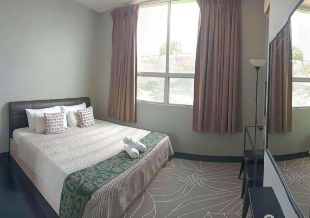 Bed in Oyasumi Hotel