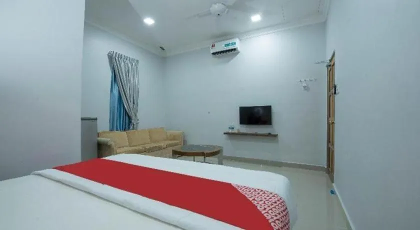 Bed in OYO 90234 Sungai Rengit City Resort 2