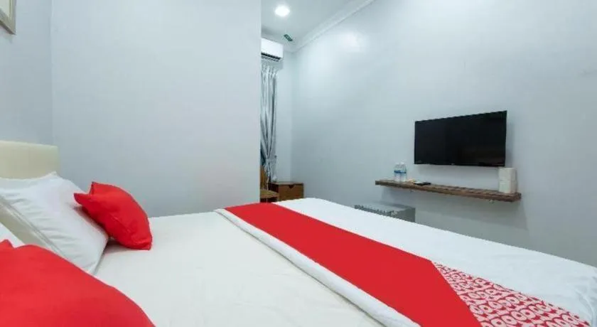 Bed in OYO 90234 Sungai Rengit City Resort 2