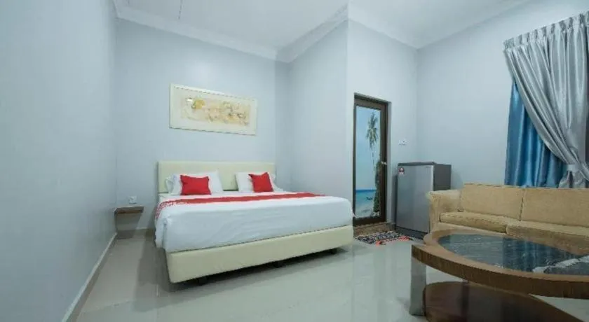Bed in OYO 90234 Sungai Rengit City Resort 2